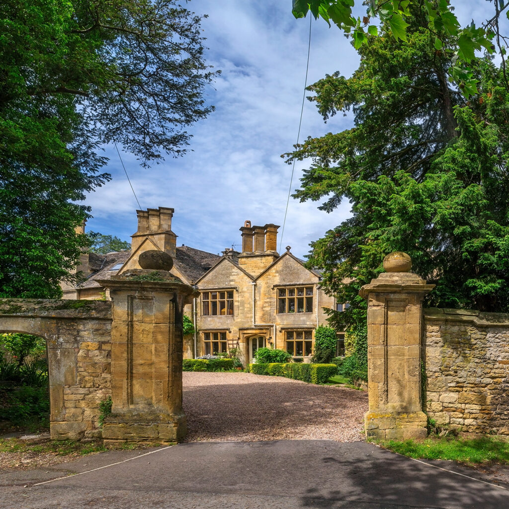 STOCK a gateway into a country house in an english village